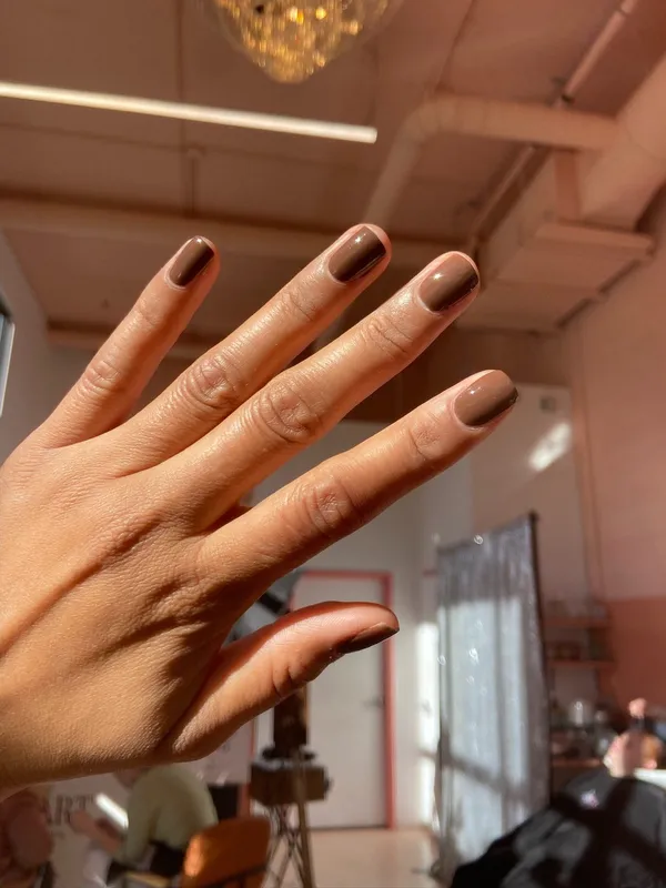 A fresh manicure in warm salon light